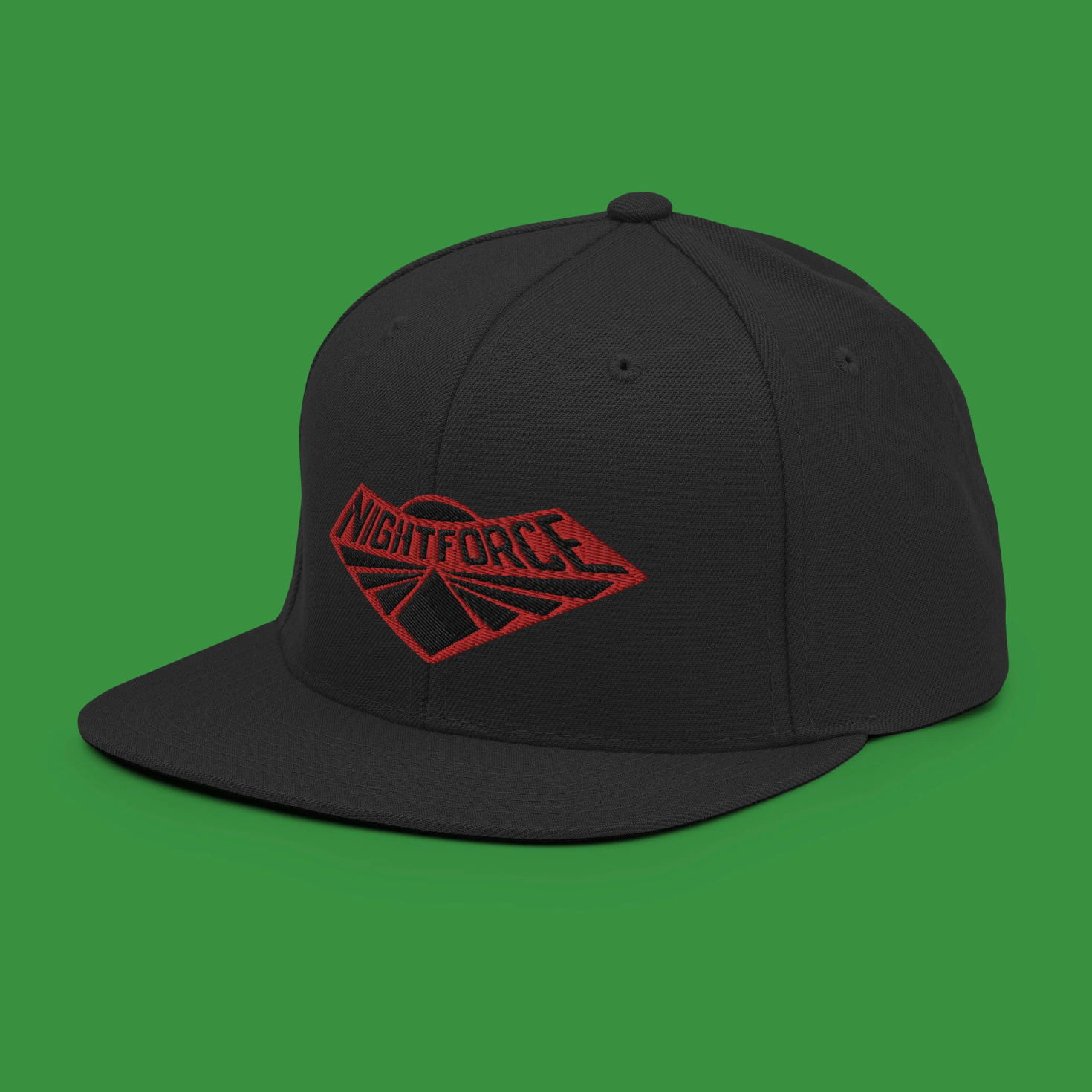 A snapback hat embroidered with the Nightforce logo, inspired by the GI Joe series. This high-quality cap is perfect for fans of vintage action figures, blending classic style with modern accessory trends.